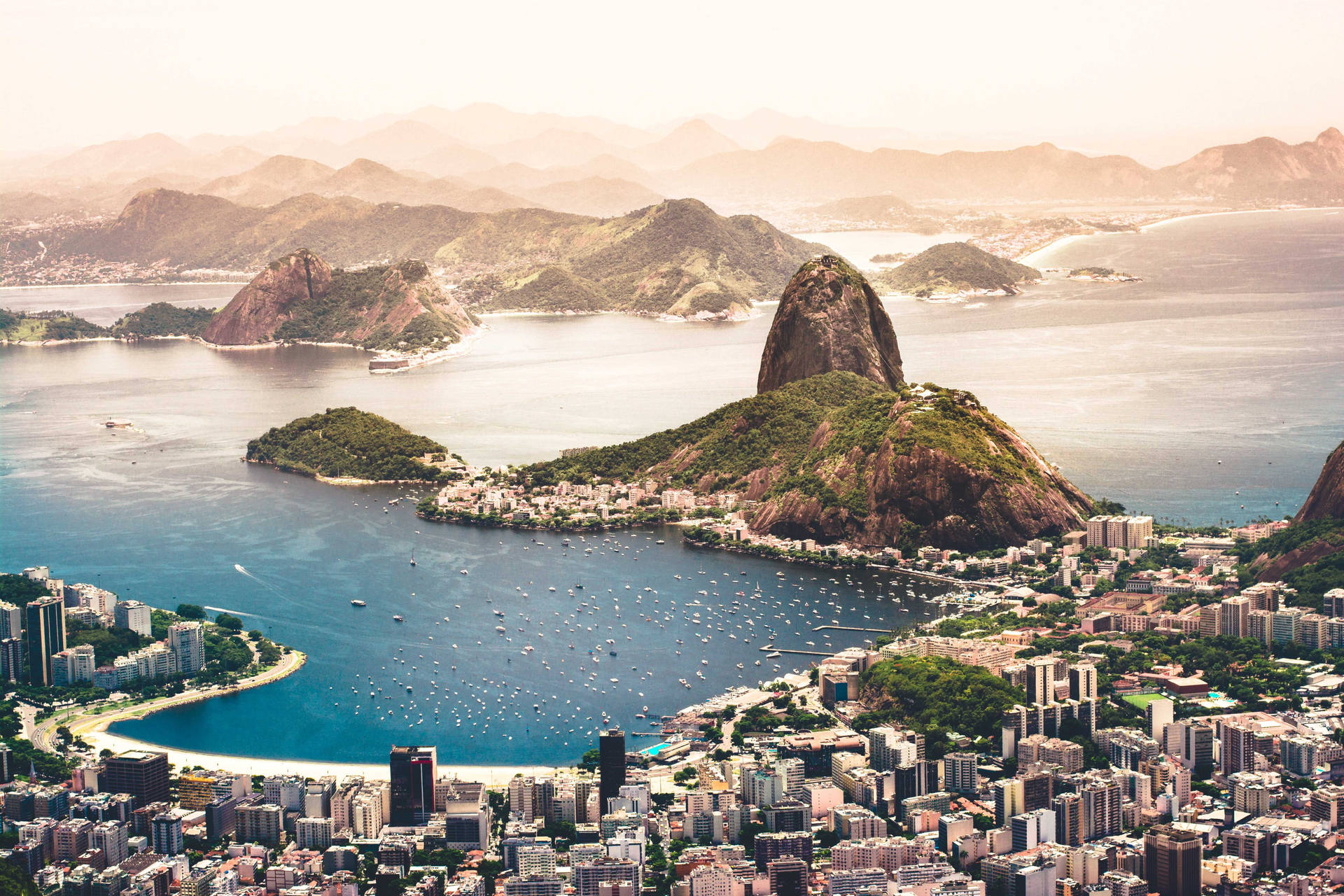 Caption: Sweeping Views From Sugarloaf Mountain, Rio De Janeiro Background