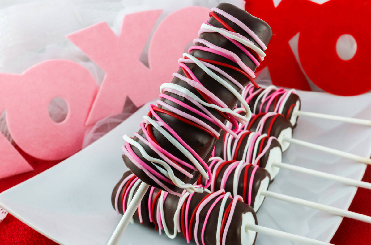 Caption: Sweet Delight! Valentine's Chocolate Marshmallow Pops Background