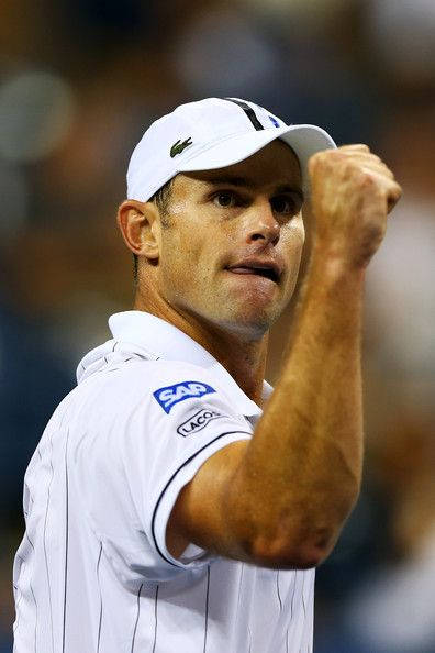 Caption: Tennis Star Andy Roddick In Action At A Championship Background