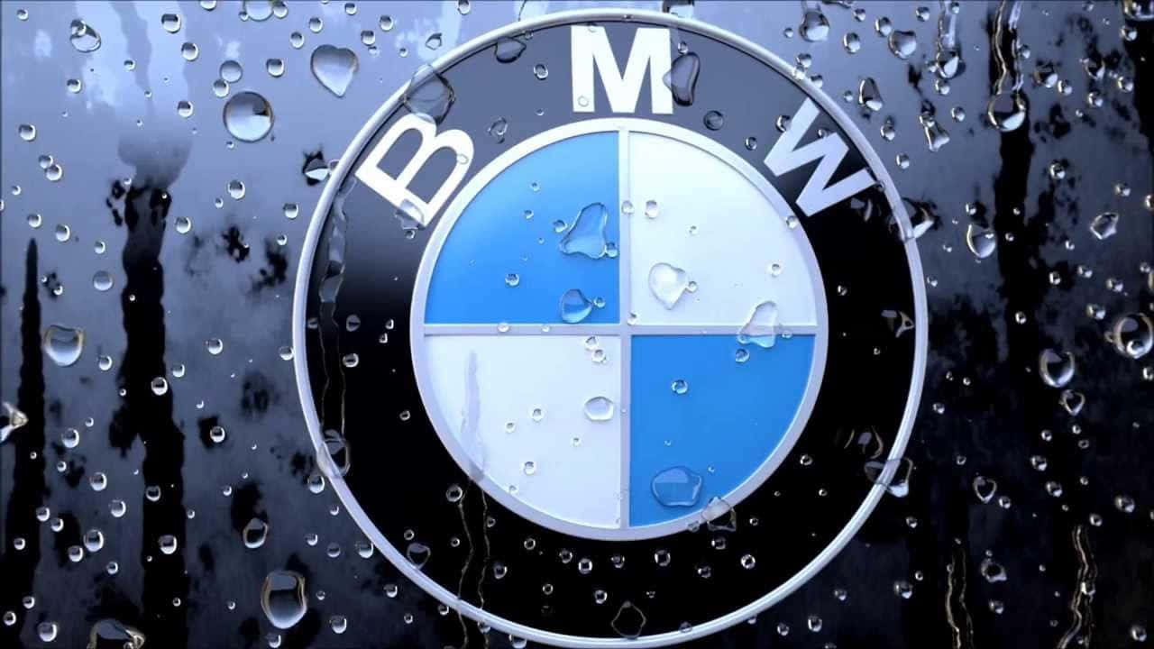 Caption: The Distinctive Bmw Logo: A Symbol Of Luxury And Performance Background