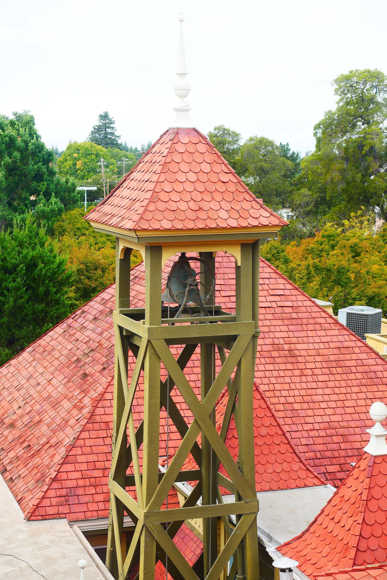 Caption: The Iconic Bell Tower Of Winchester Mystery House Background