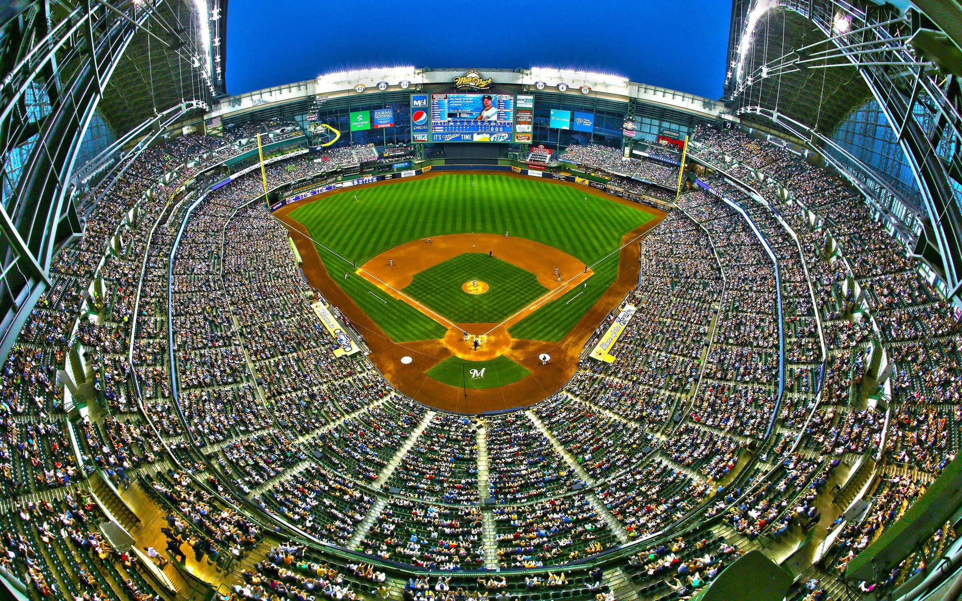 Caption: The Magnificent American Family Field Stadium In Milwaukee Background