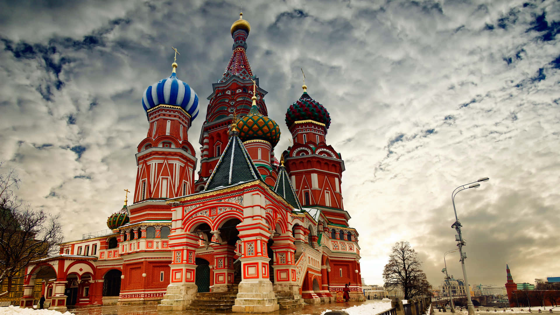 Caption: The Majestic Saint Basil's Cathedral Under An Overcast Sky. Background