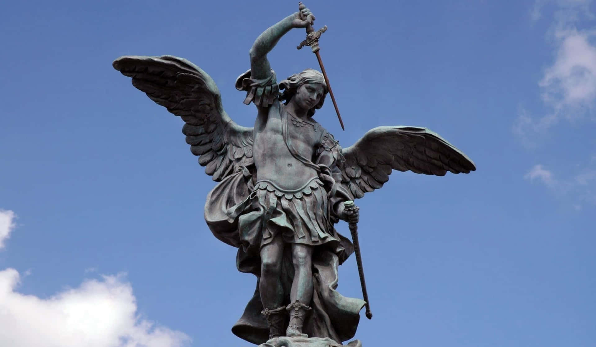 Caption: The Majestic Saint Michael The Archangel Background