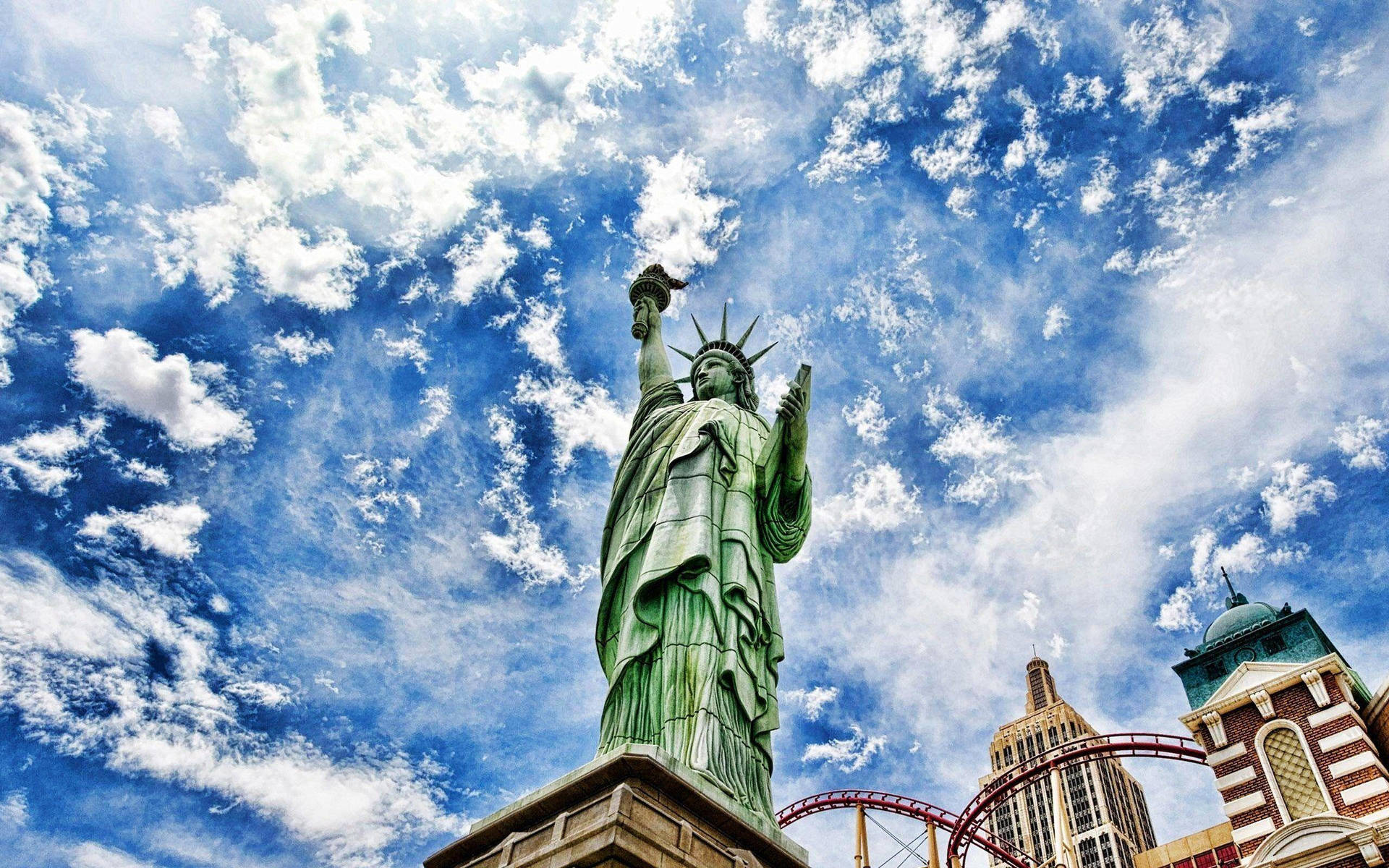 Caption: The Majestic Statue Of Liberty Illuminated At Twilight