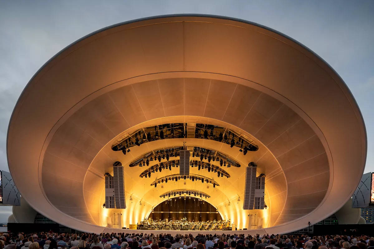 Caption: The San Diego Symphony Orchestrating Brilliance At Randy Hall Background