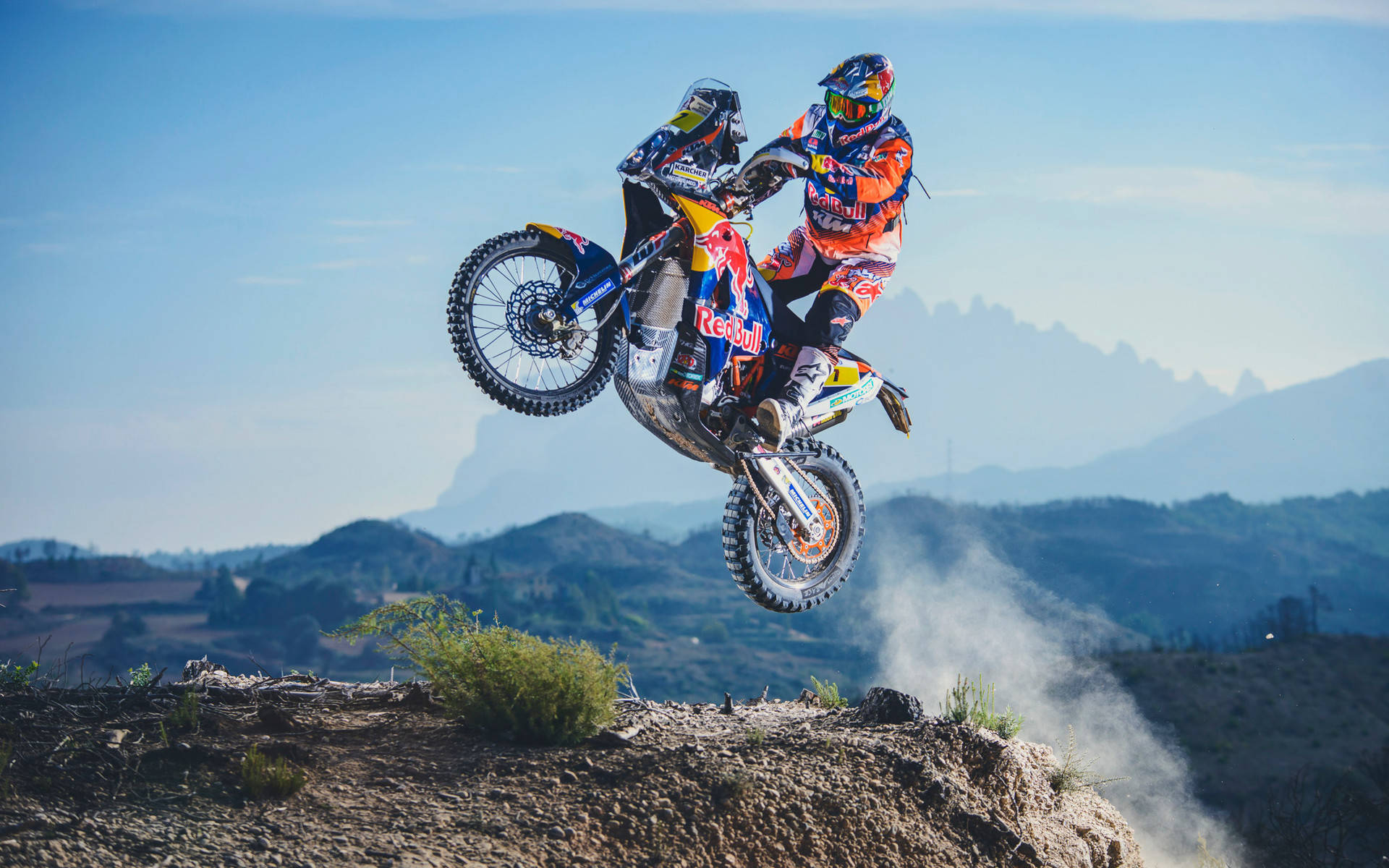 Caption: Thrilling Dakar Rally In Full Action Background