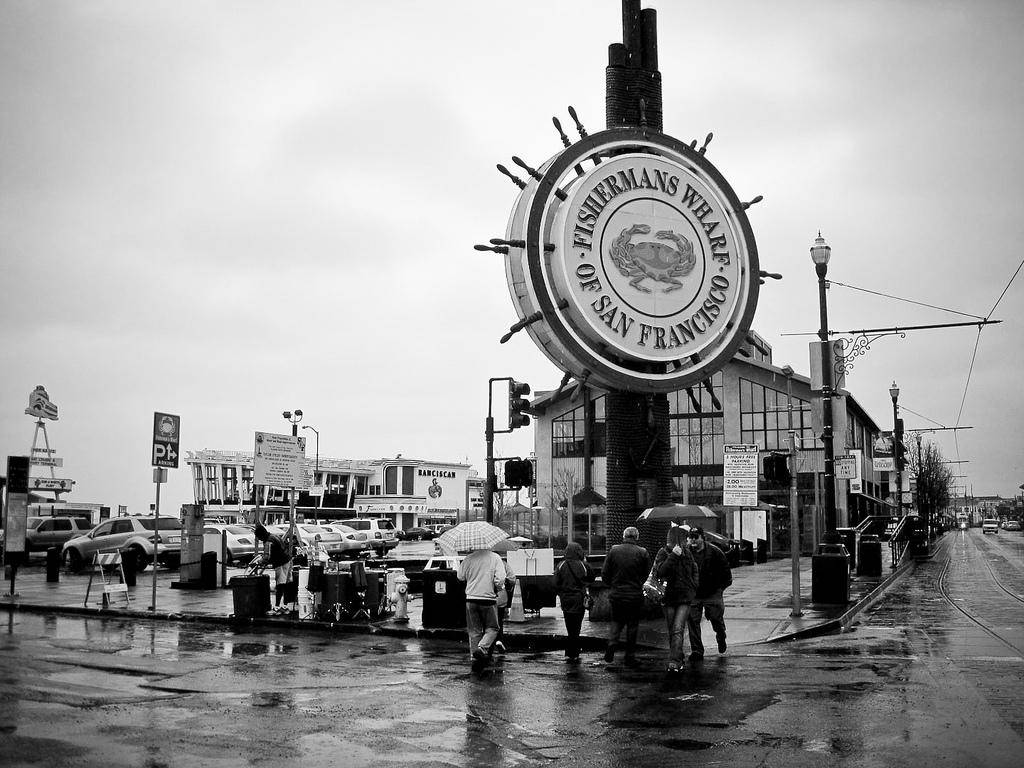 Caption: Timeless Elegance Of Fisherman's Wharf Background