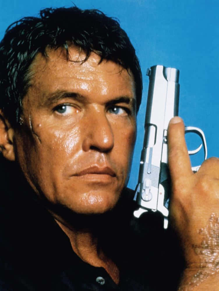 Caption: Tom Berenger - A Versatile And Talented Actor Background