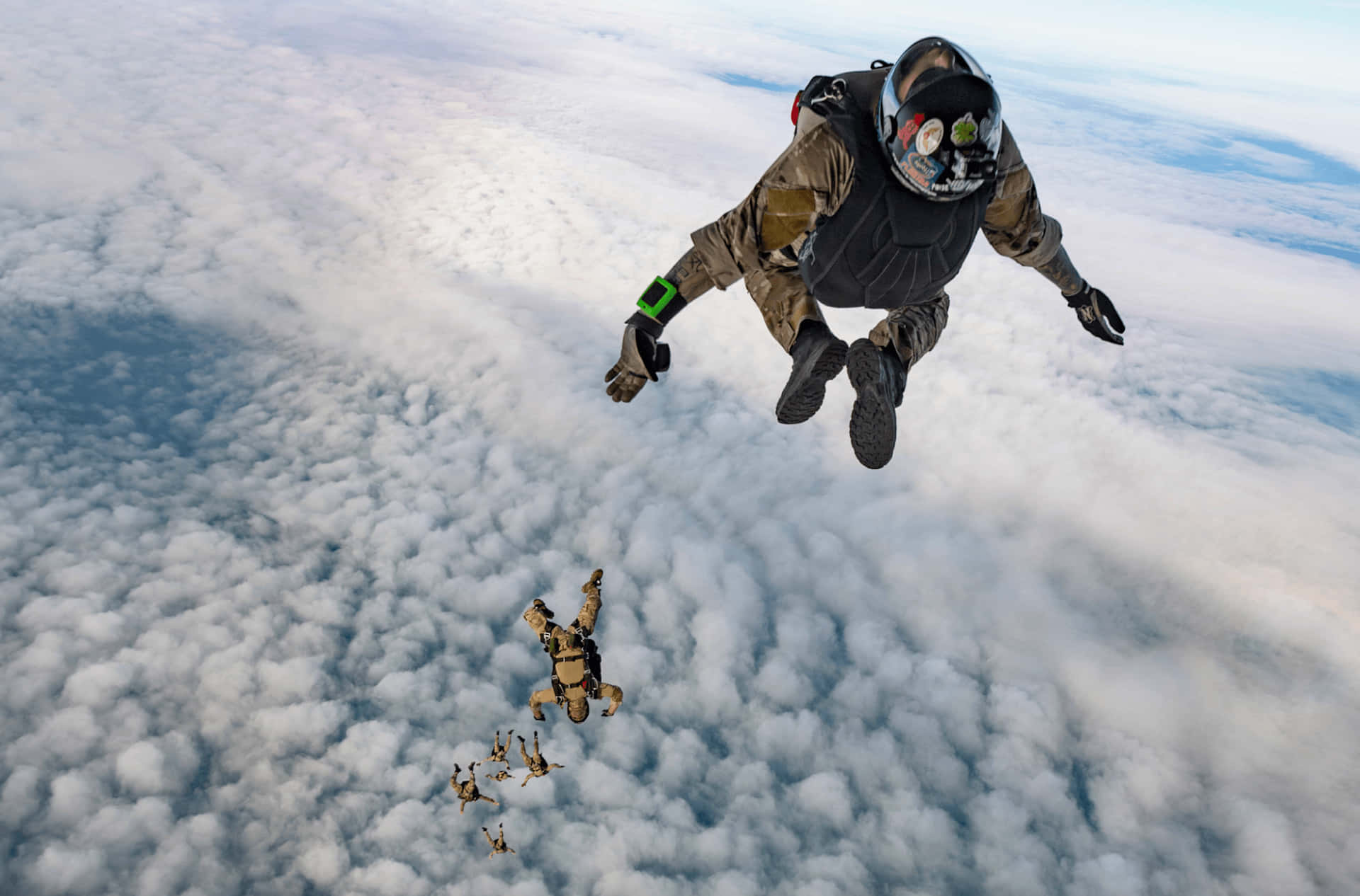 Caption: Top Of The Clouds Skydiving Background