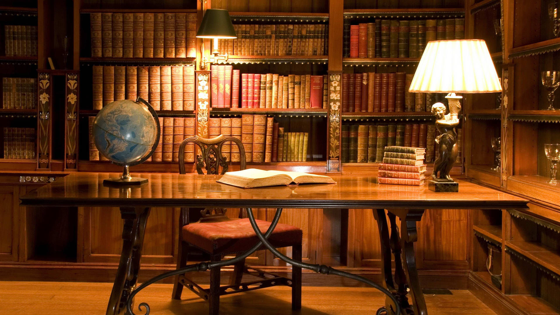 Caption: Traditional Library Desk In An Elegant Setting Background
