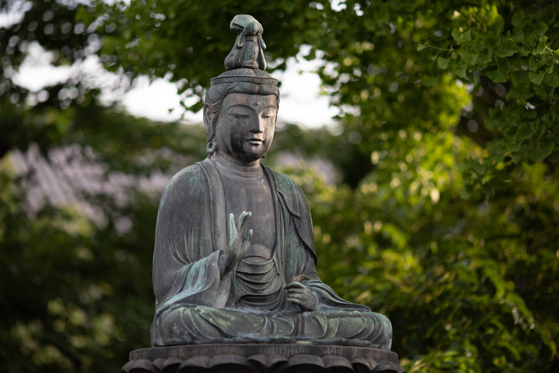 Caption: Tranquil 3d Illustration Of Buddha Statue Background