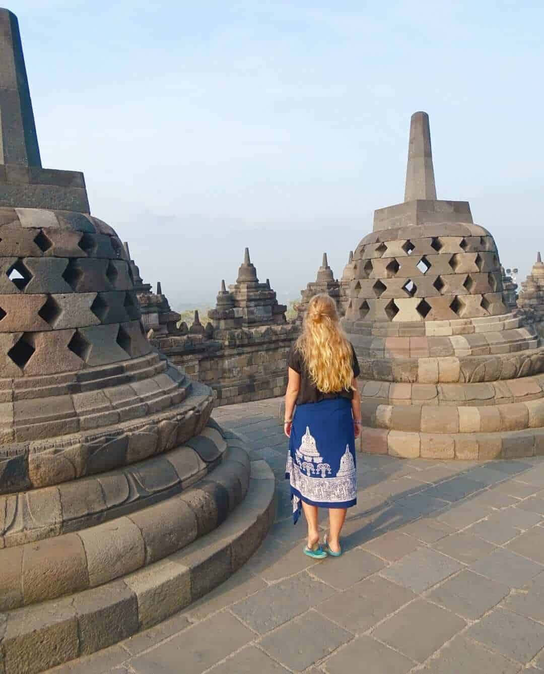 Caption: Tranquil Moments At Borobudur Temple. Background