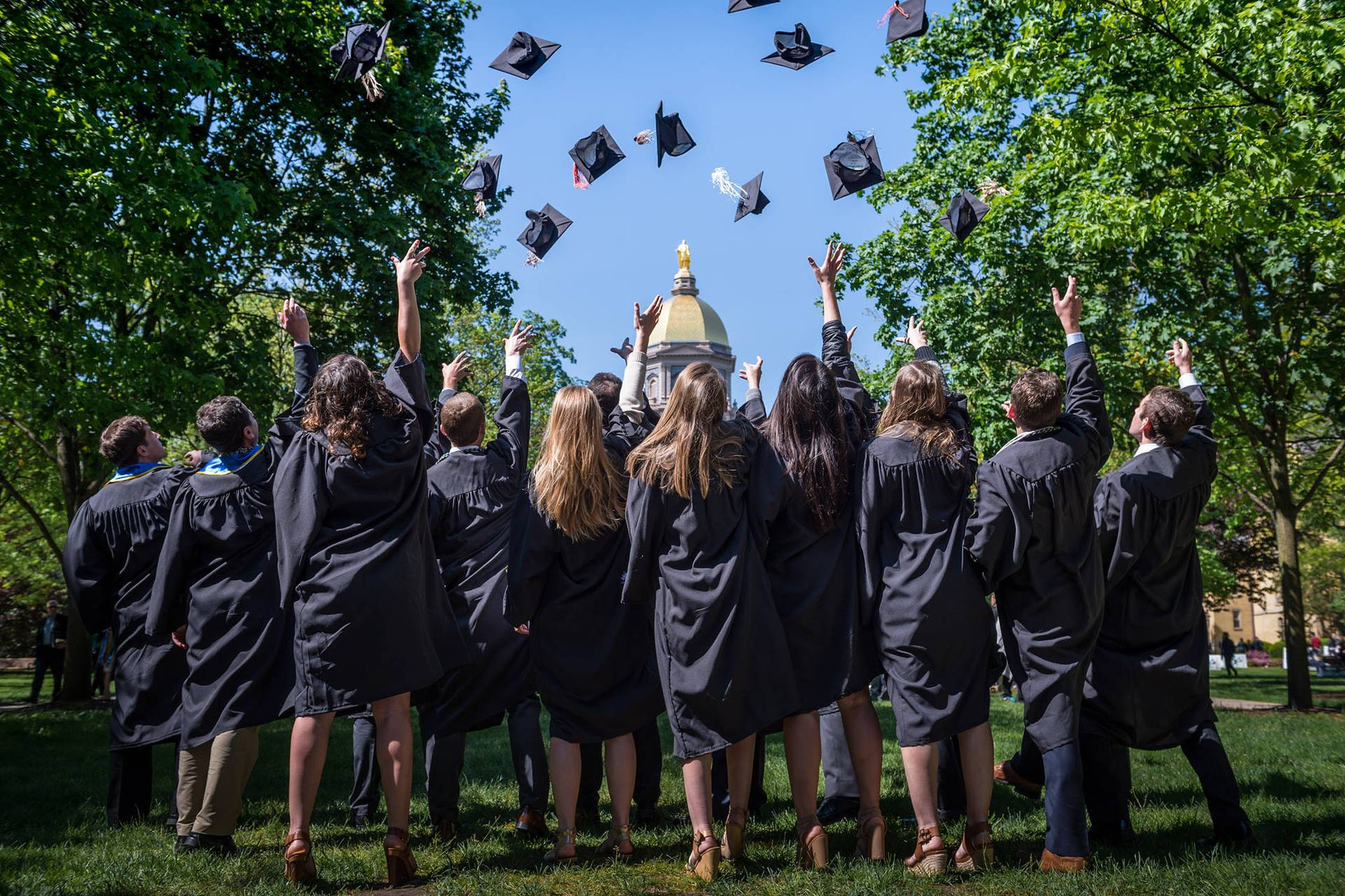 Caption: University Of Notre Dame Graduation Day Background