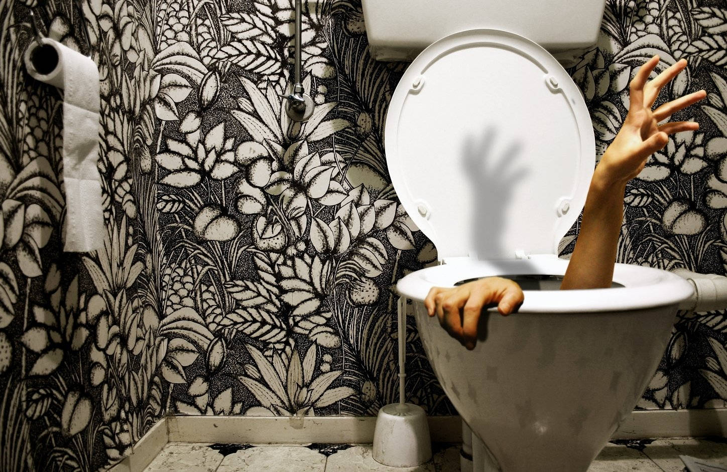 Caption: Unusual Perspective Of Modern Toilet Bowl Background