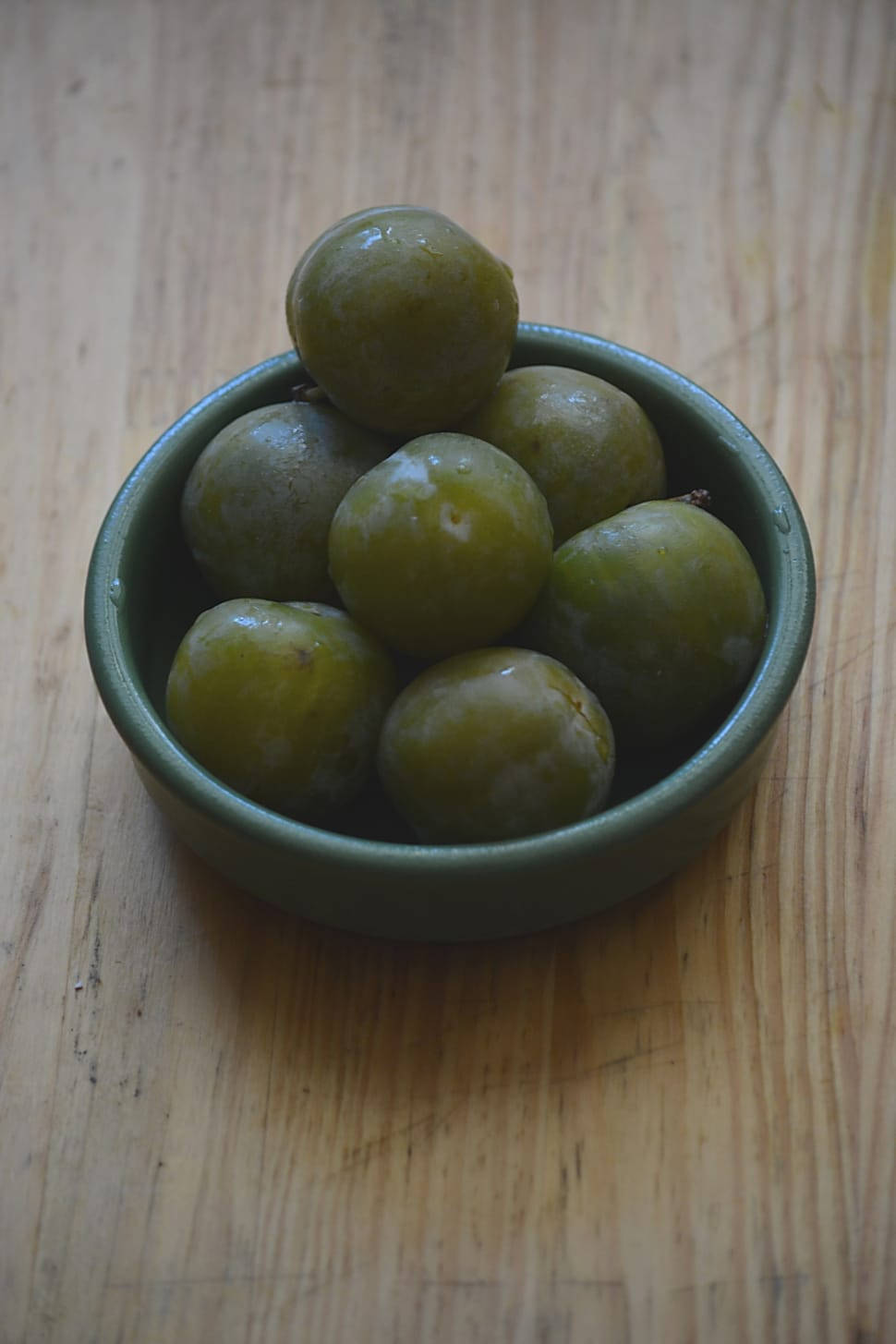 Caption: Up Close View Of A Lush Green Olive Seed Background