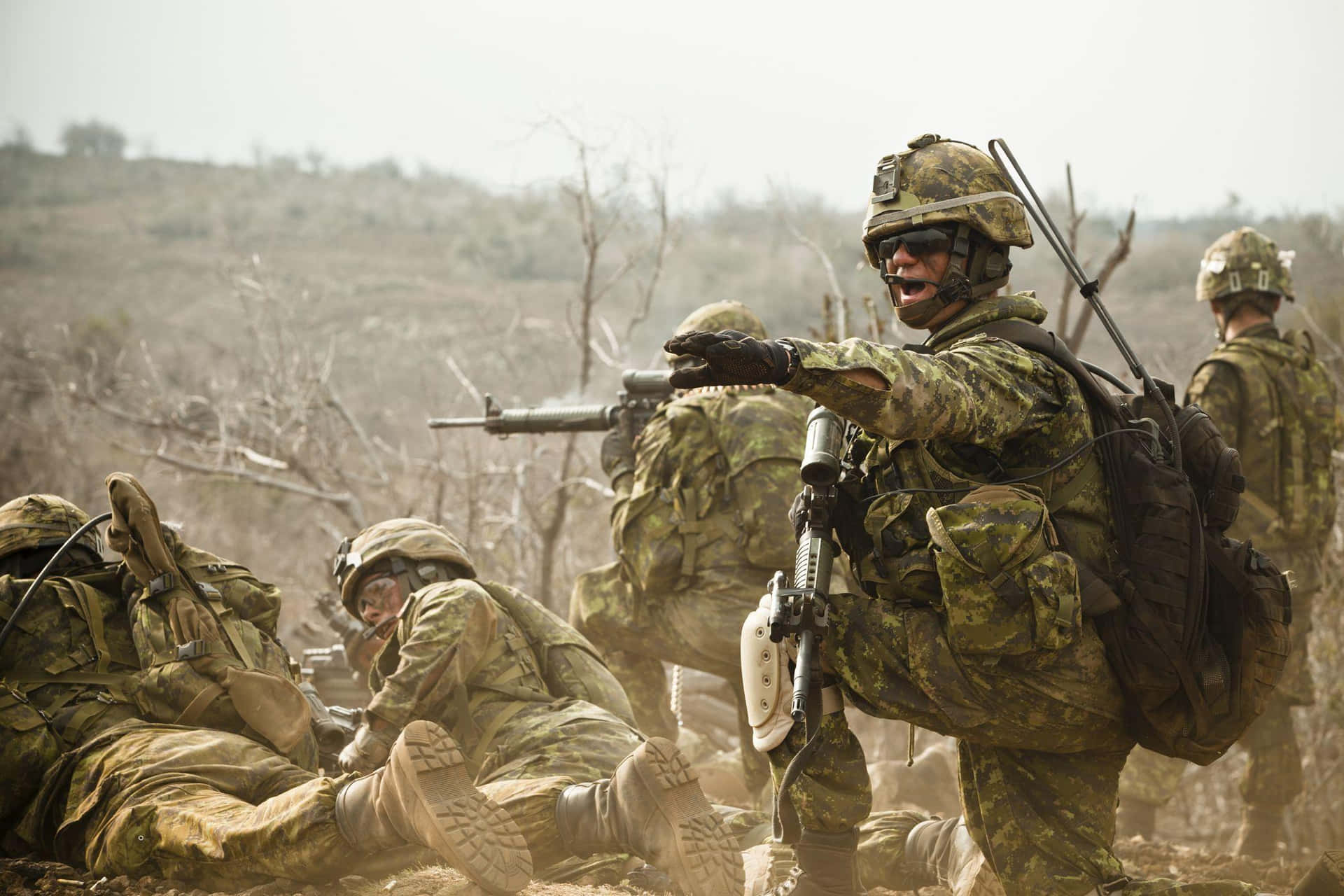 Caption: Us Military Force In Action Background