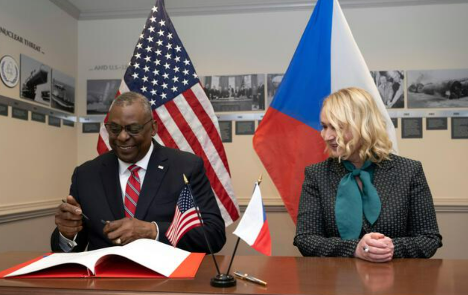 Caption: Us Secretary Of Defense Signing Reciprocal Defense Procurement Agreement Background