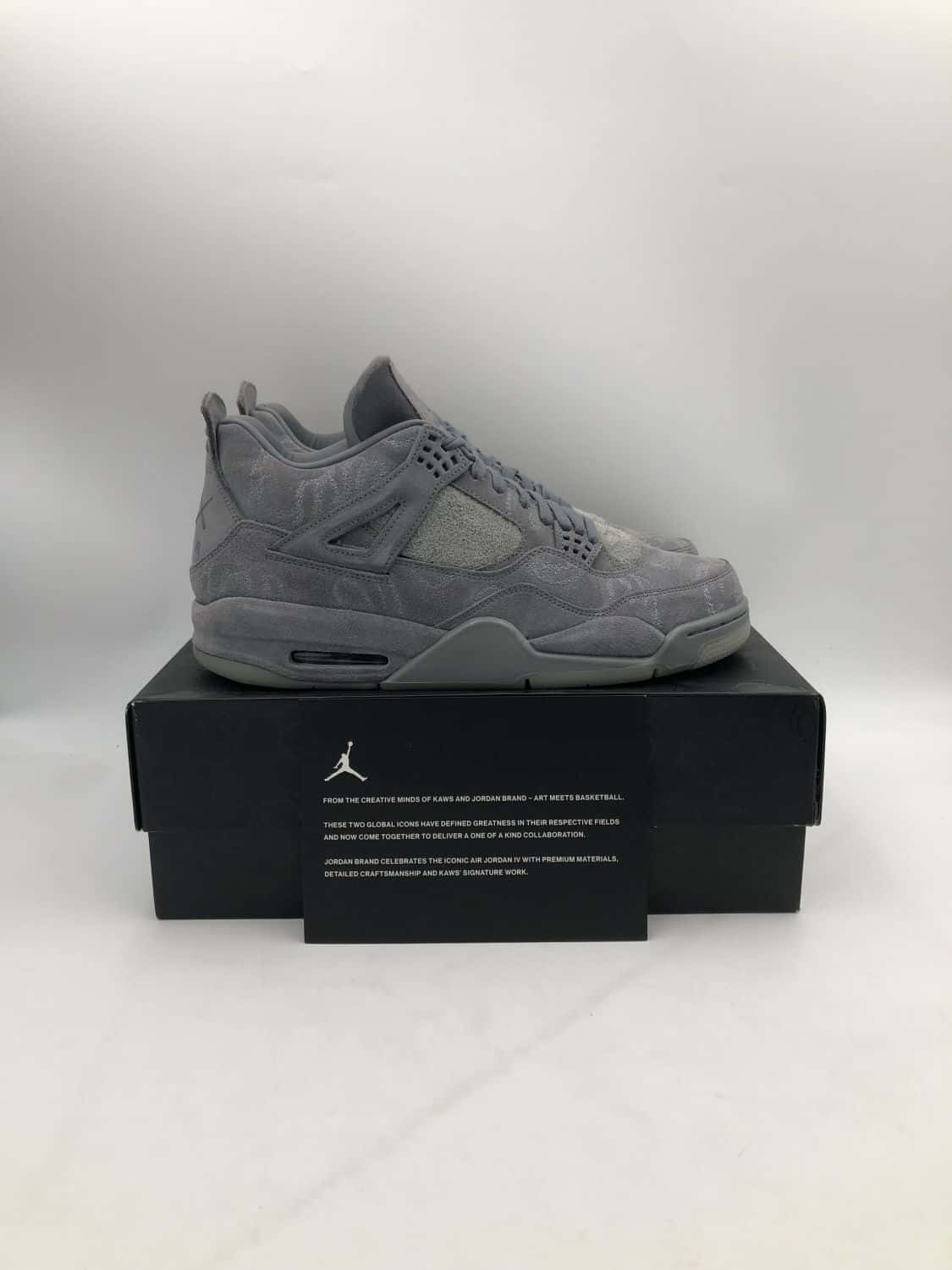 Caption: Verified Nike Air Jordan 4 In Classic Gray