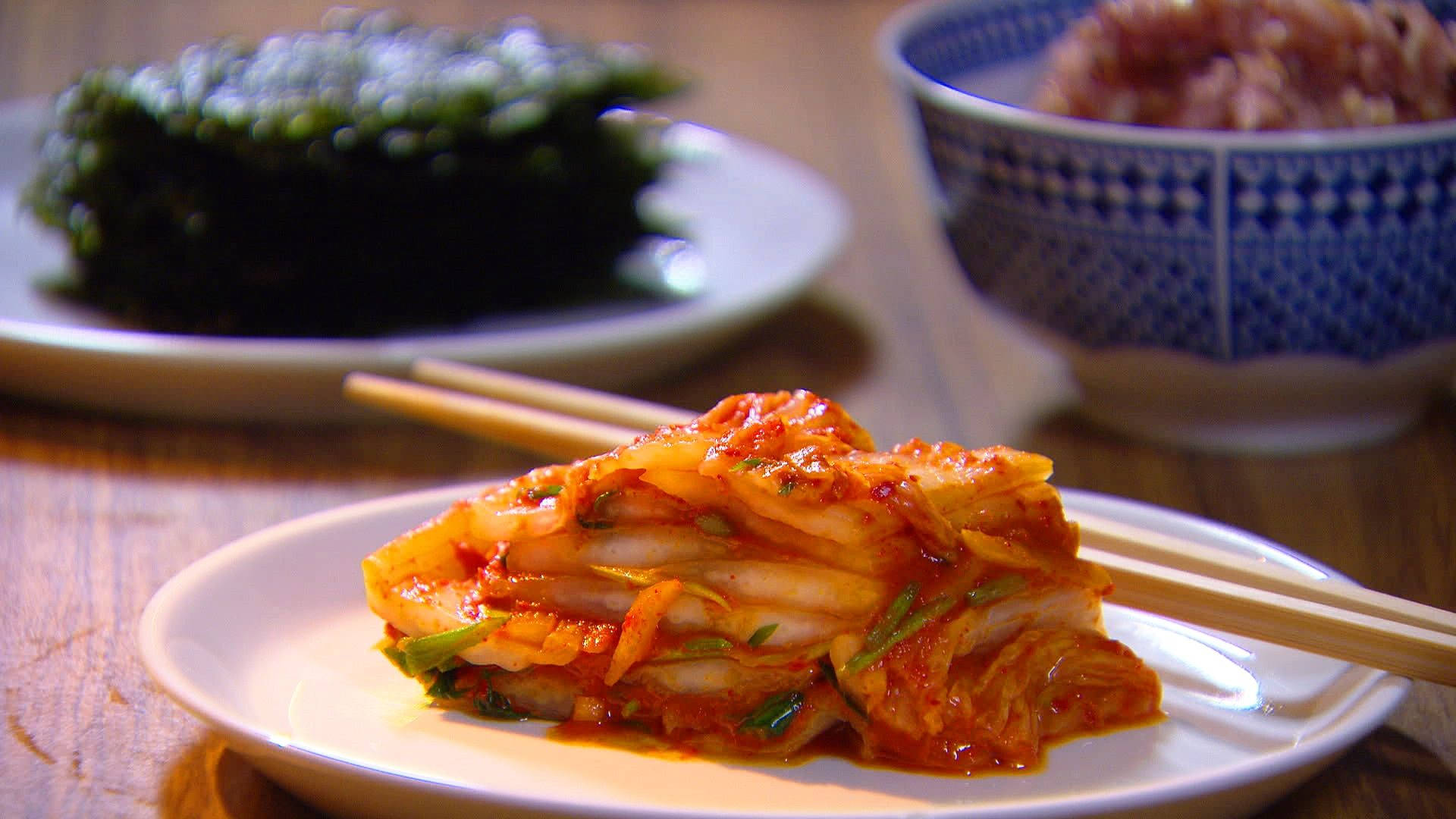 Caption: Vibrant And Flavorful Traditional Korean Kimchi Background