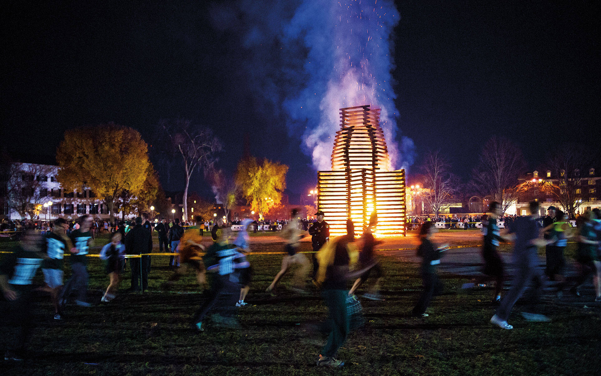 Caption: Vibrant Bonfire At Dartmouth College Background