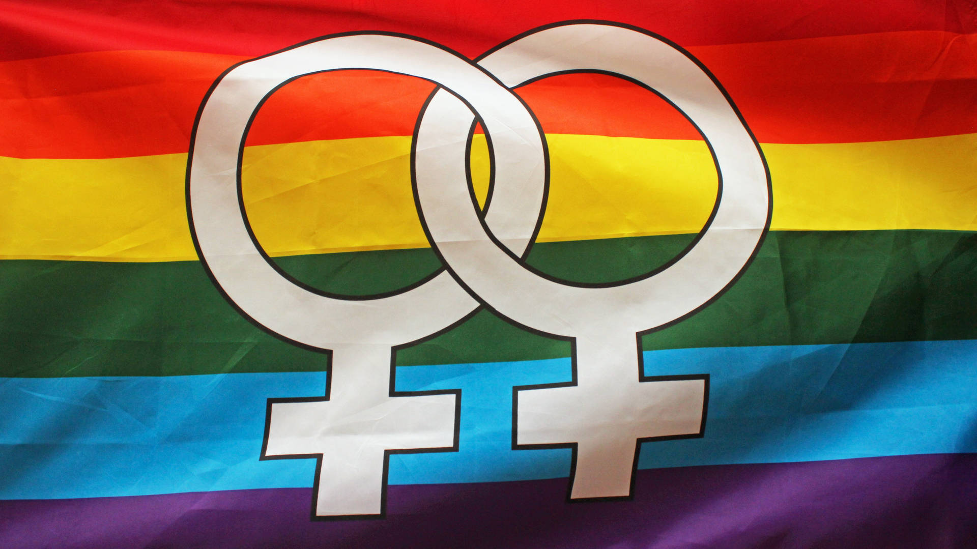 Caption: Vibrant Display Of The Pride Flag Symbolizing Lesbian Unity