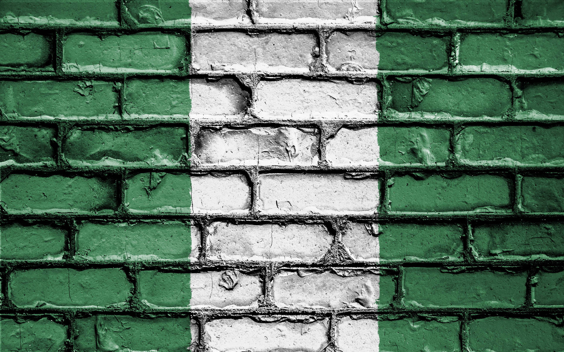 Caption: Vibrant Nigerian Colors On A Vintage Brick Wall Background