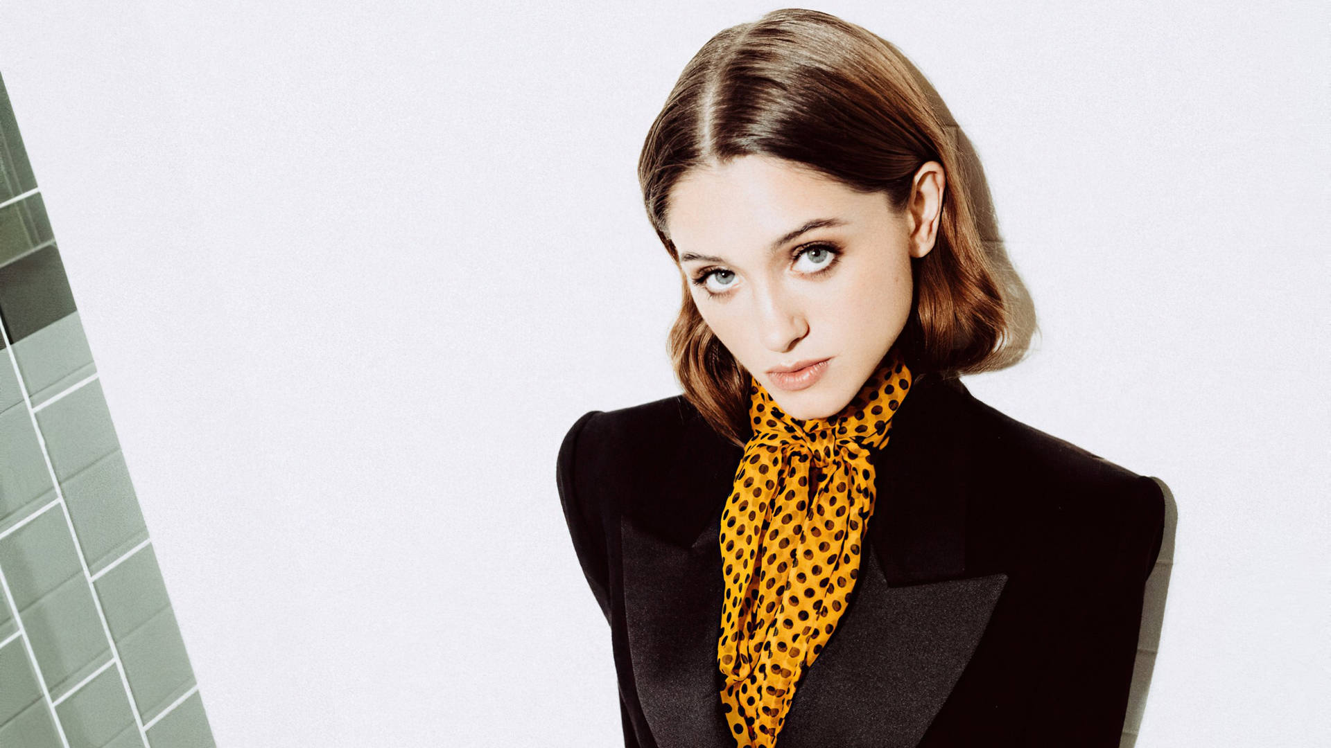 Caption: Vibrant Portrait Of Natalia Dyer With Short Hair