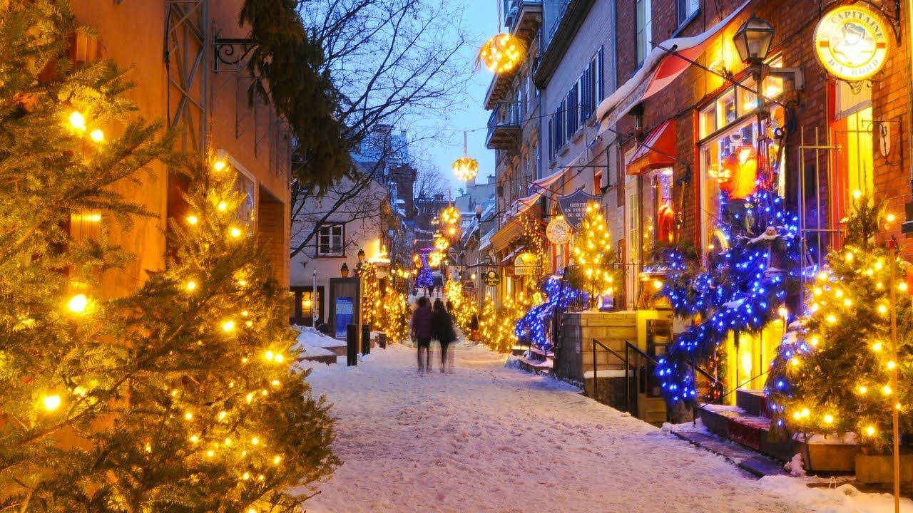 Caption: Vibrant Quebec City Nightscape Background