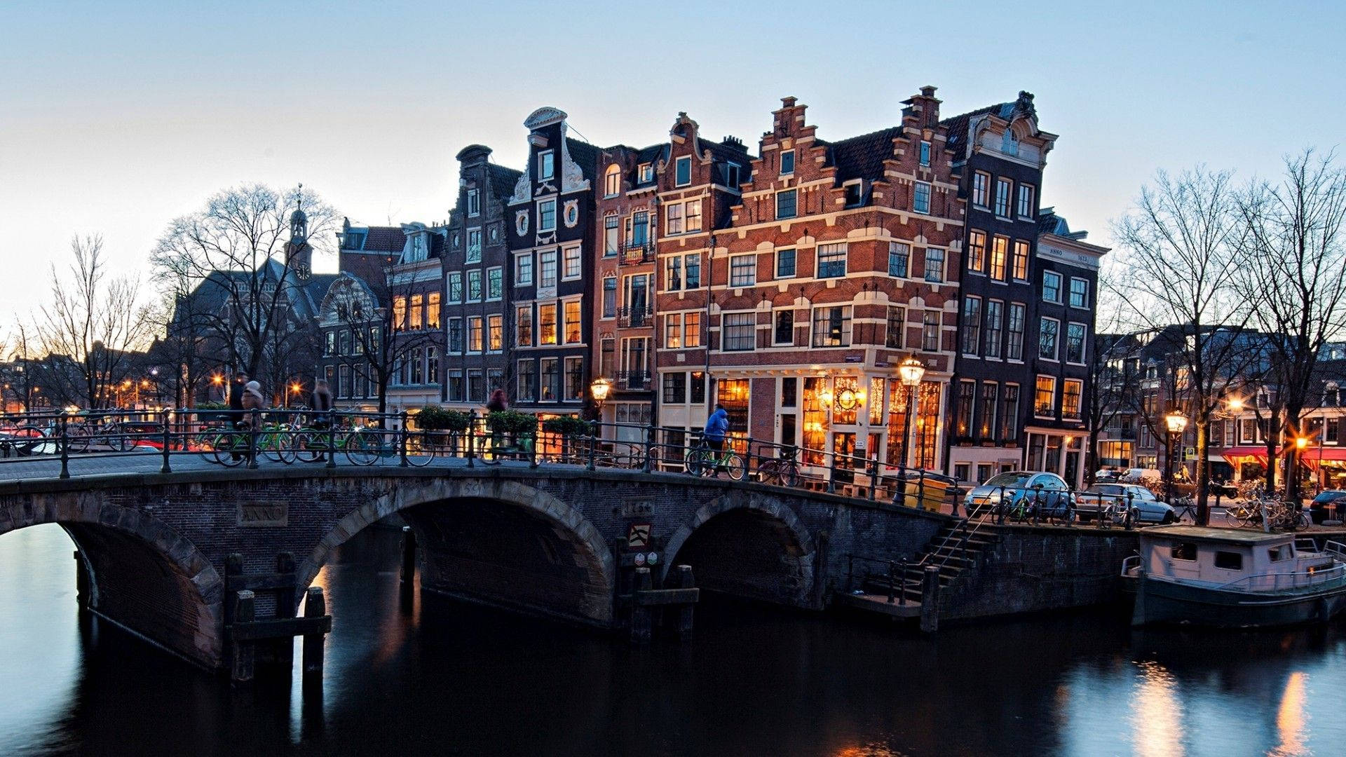 Caption: Vibrant Scene Of Amsterdam's Red Light District Background