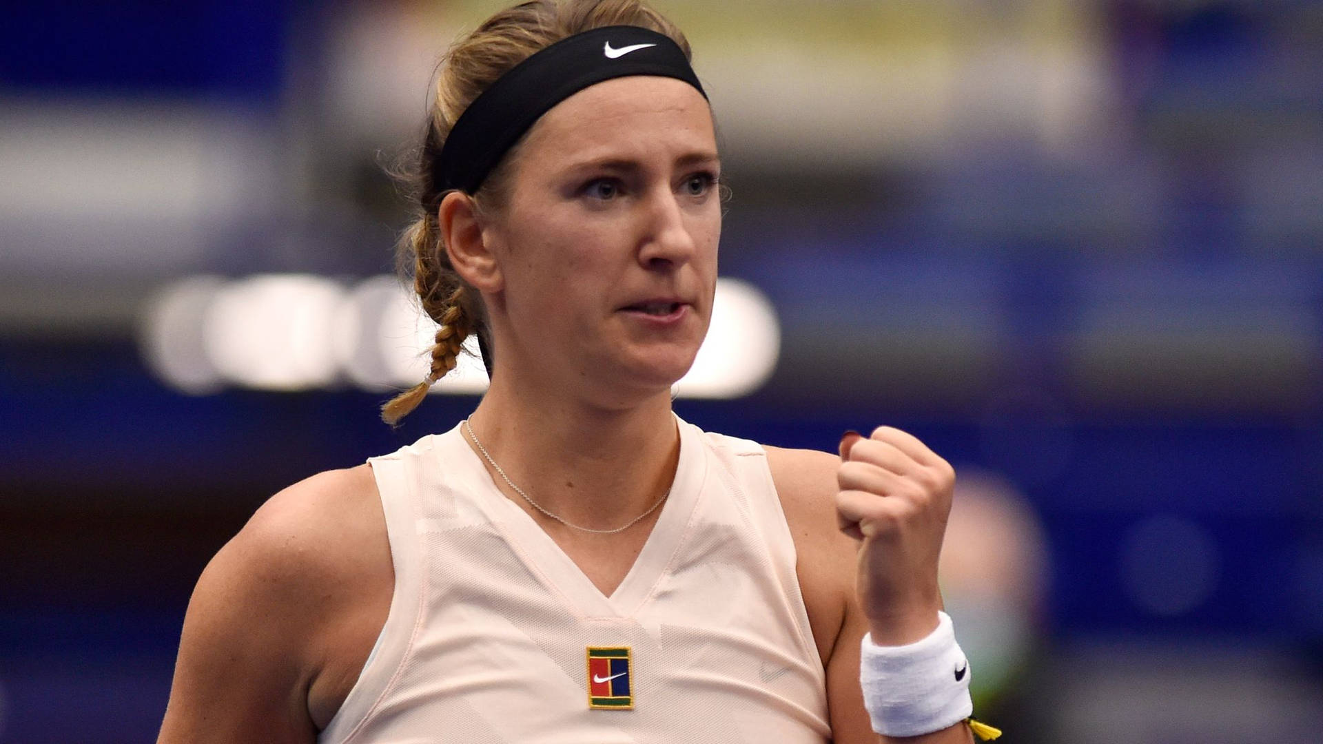 Caption: Victoria Azarenka Celebrating With A Powerful Fist Pump Gesture