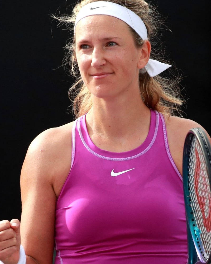 Caption: Victoria Azarenka: The Tennis Maestro In Purple