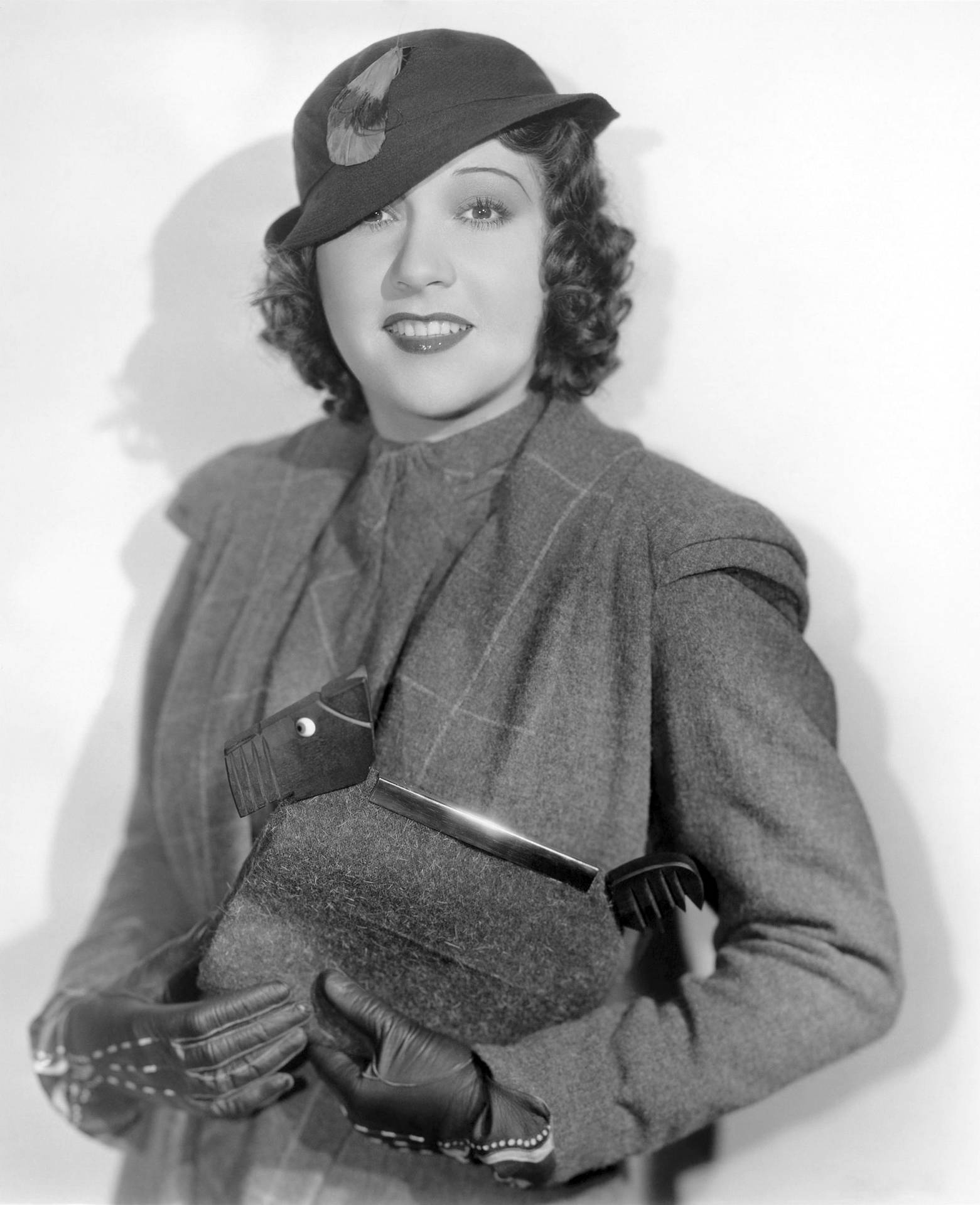 Caption: Vintage Glamour: Stage Actress Ethel Merman Background