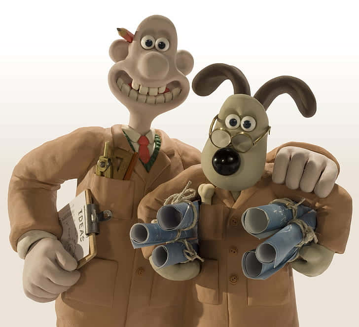 Caption: Wallace & Gromit Examine Blueprints In The Curse Of The Were-rabbit. Background