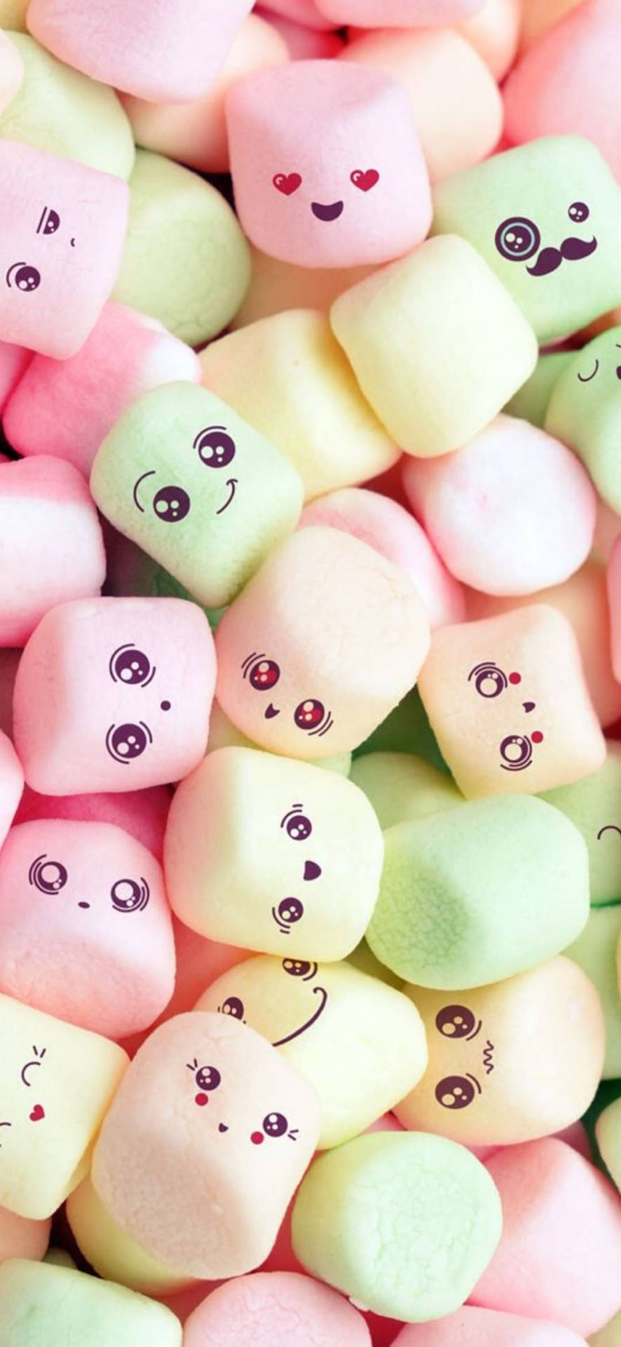 Caption: Whimsical Marshmallow Faces On Pastel Background