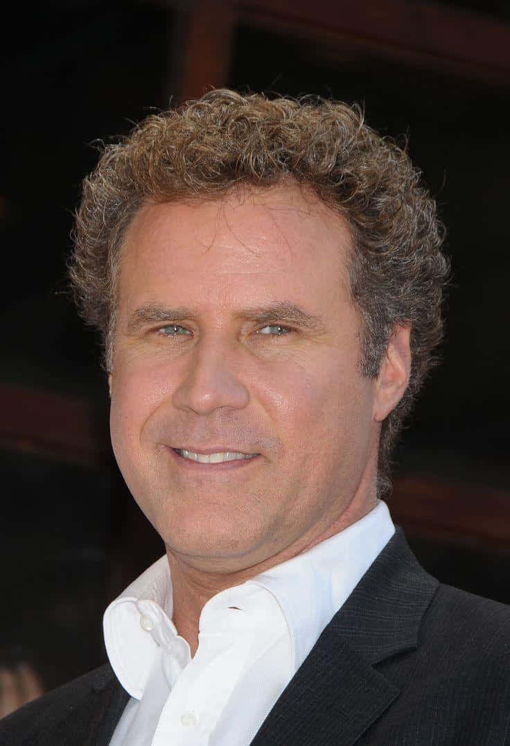 Caption: Will Ferrell Smiling In A Stylish Suit Background