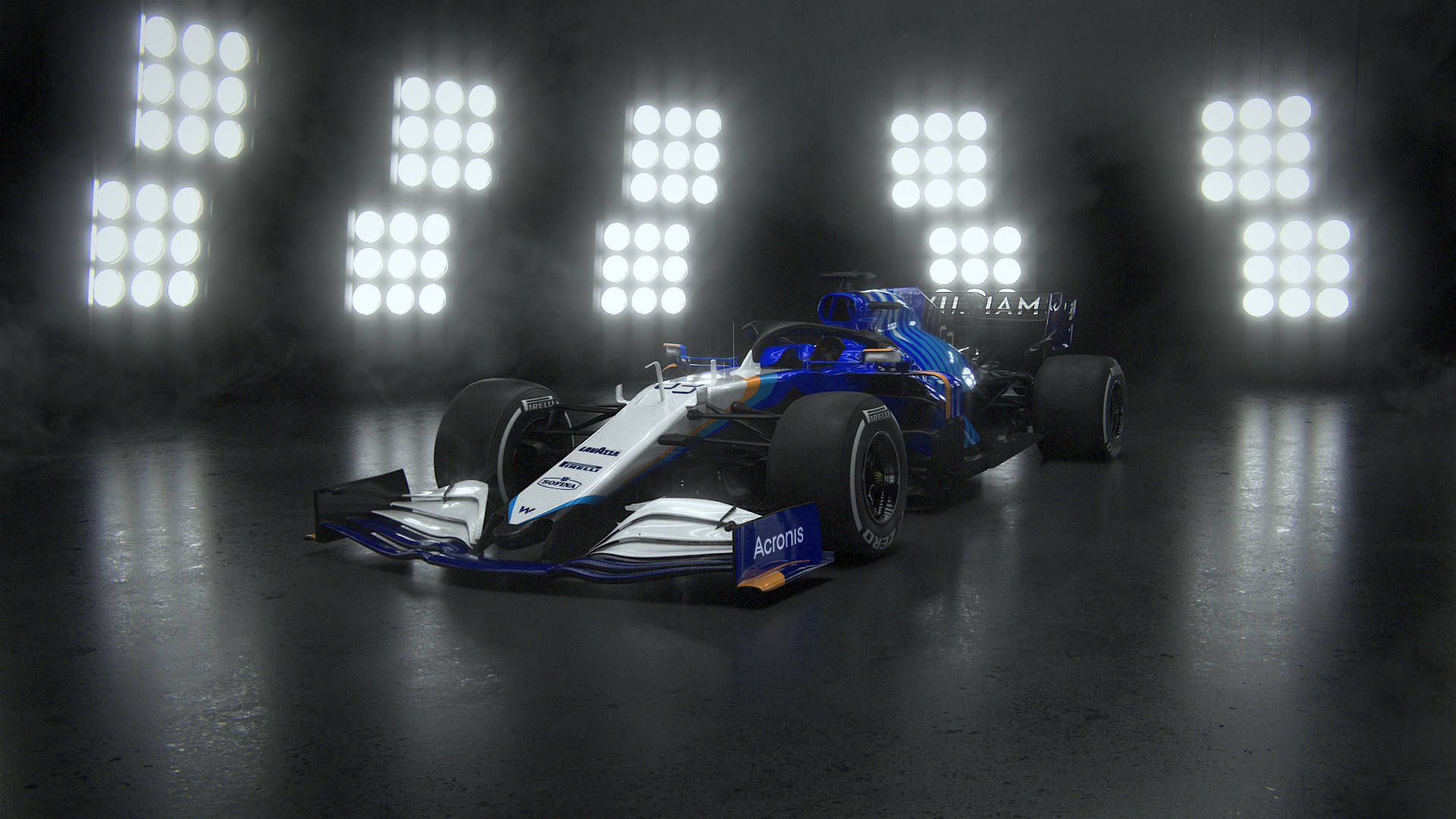 Caption: Williams Racing Car Illuminated By Spotlights