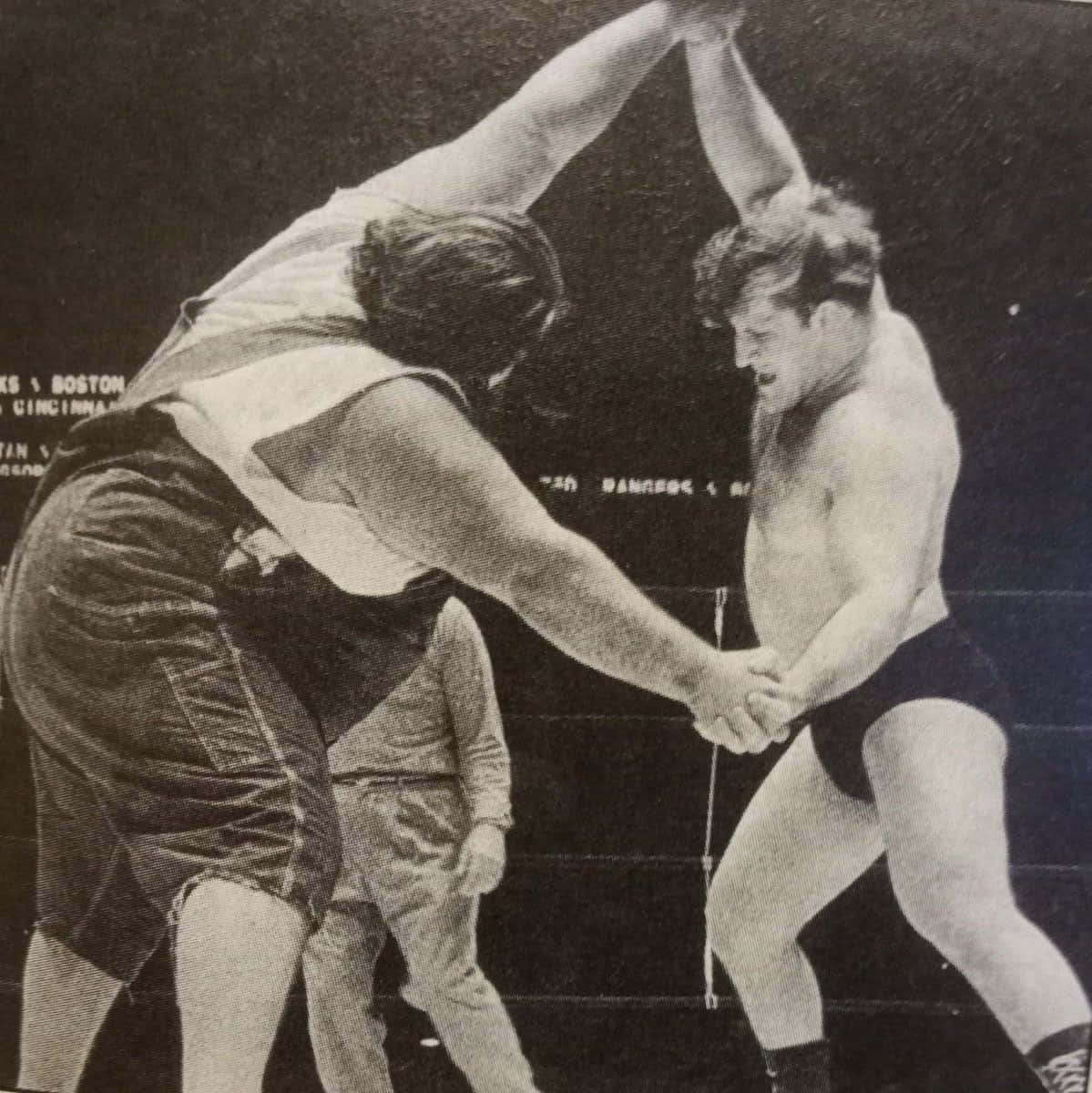 Caption: Wrestling Legends Face-off: Haystacks Calhoun Versus Sammartino Match Background
