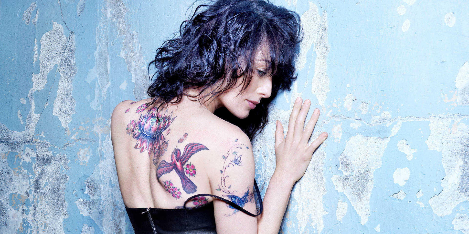 Captivating Art: An Intricate Hd Tattoo On A Woman