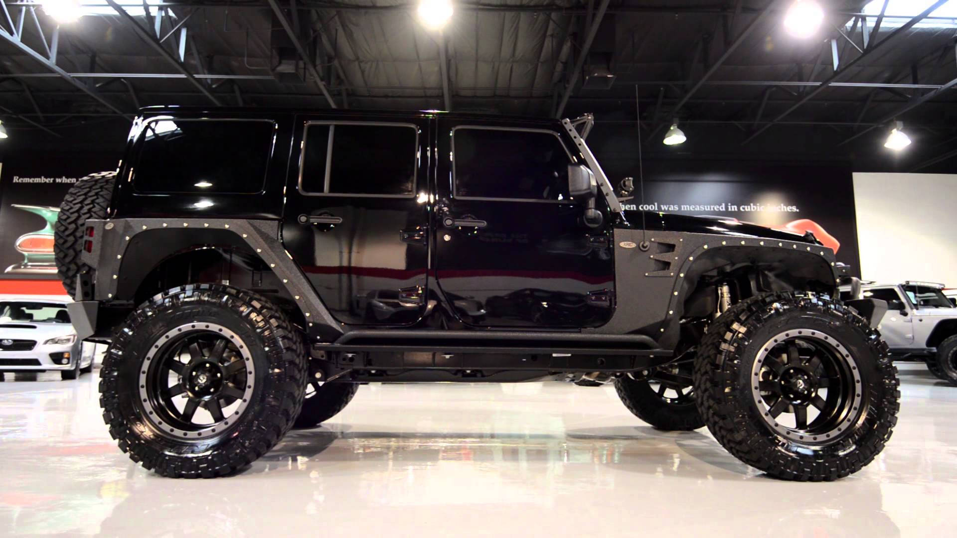 Captivating Black Jeep Wrangler In The Wild Background