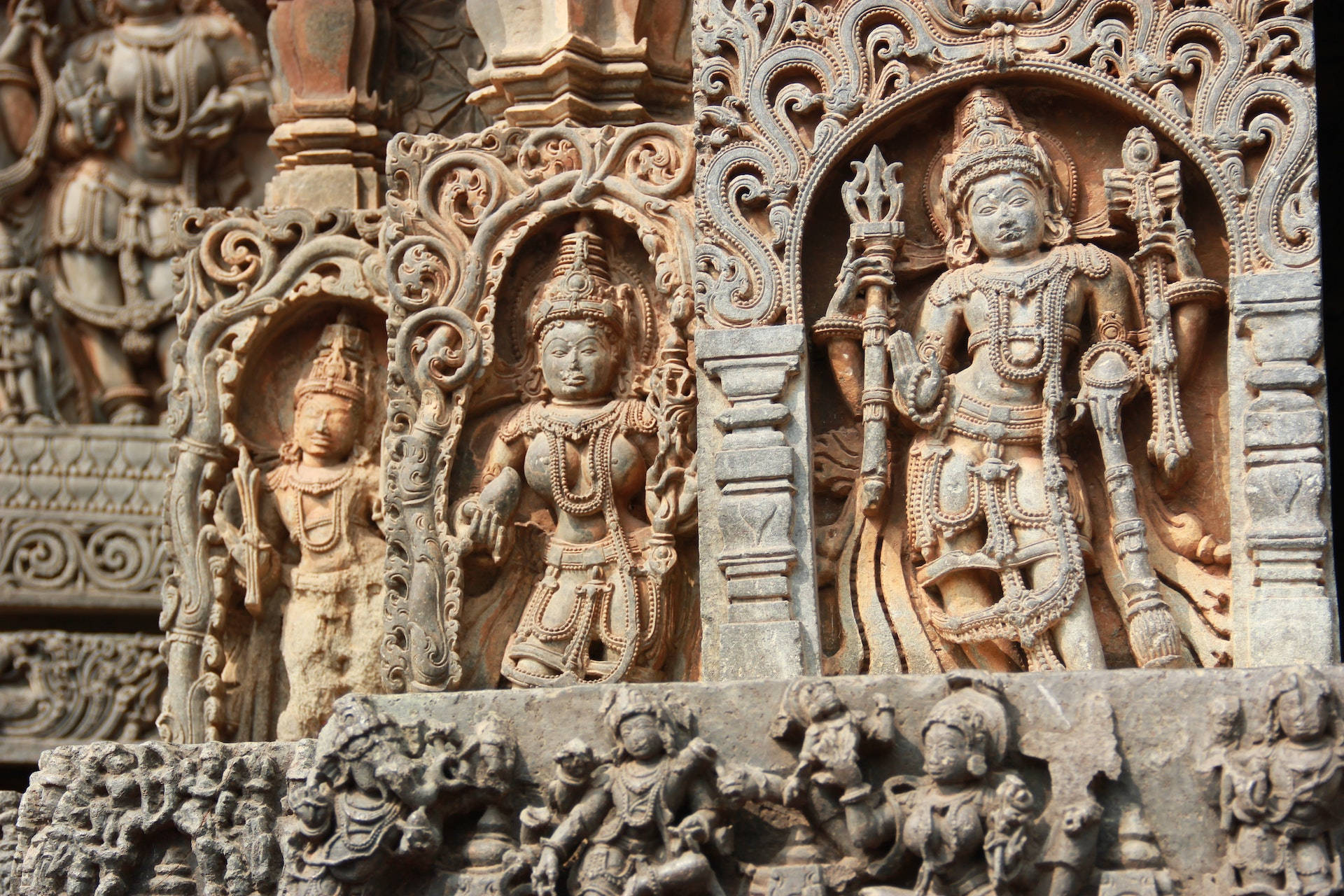 Captivating Carvings Of A Hindu Goddess Background