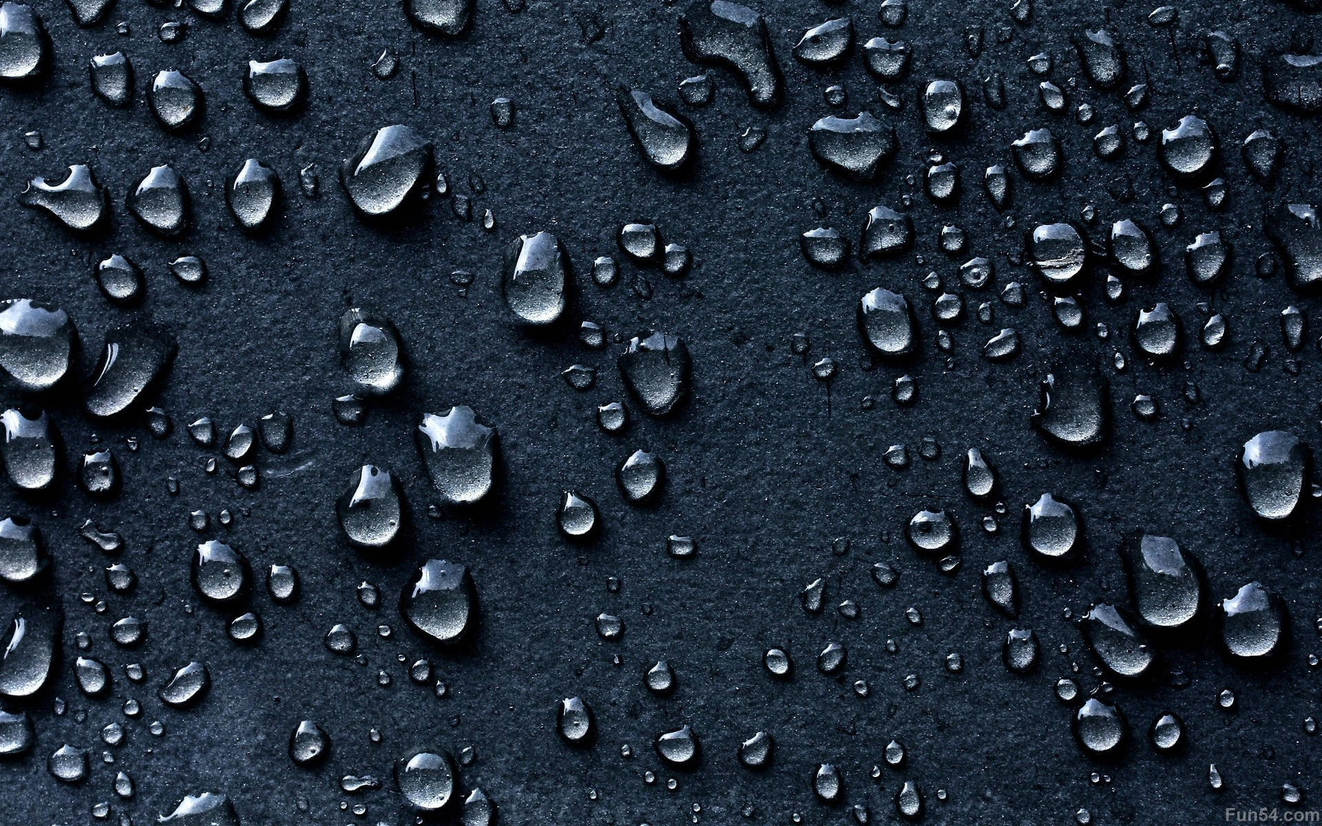 Captivating Close-up Of Dark Water Droplets Background