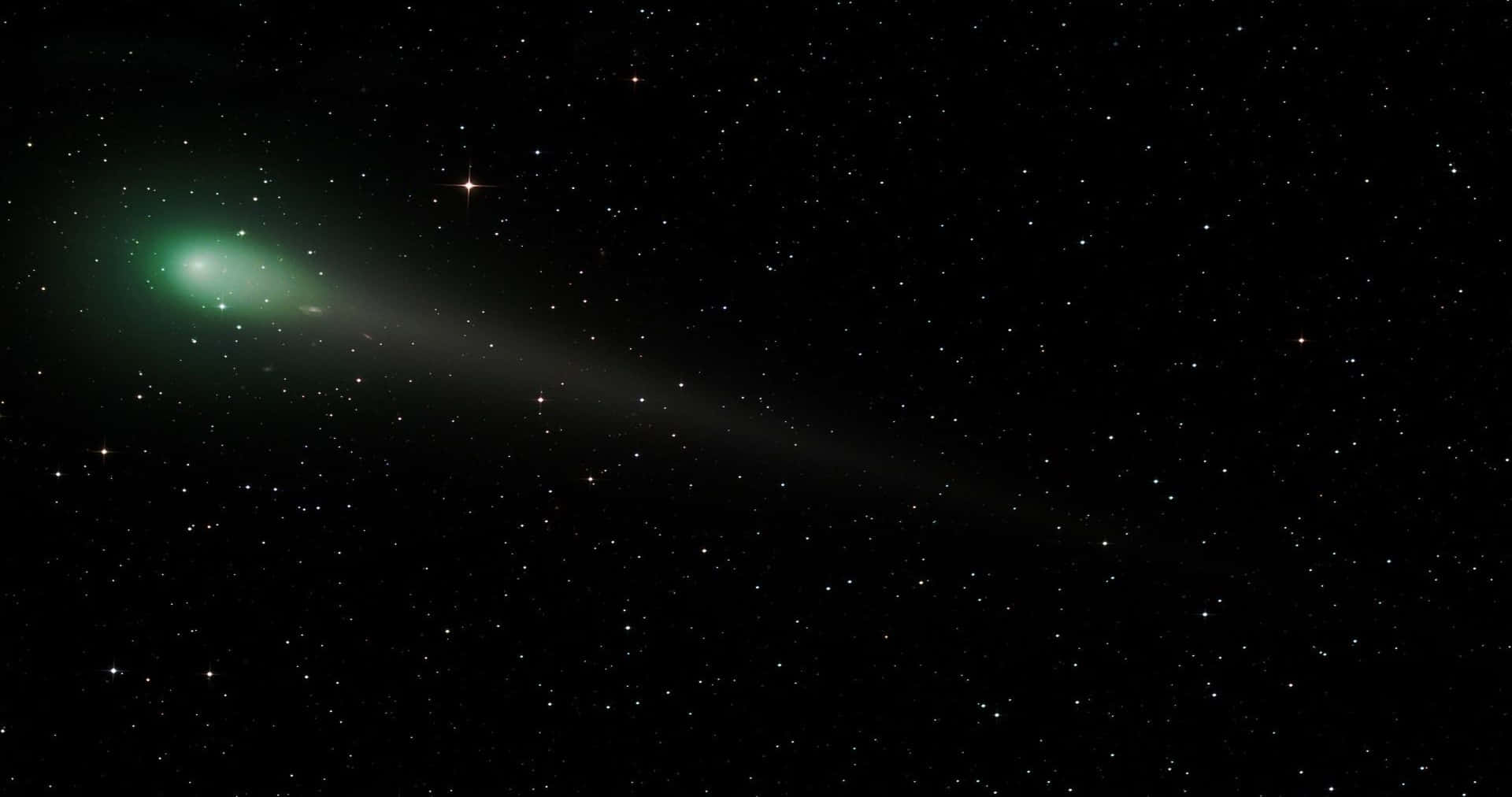 Captivating Comet In The Night Sky Background