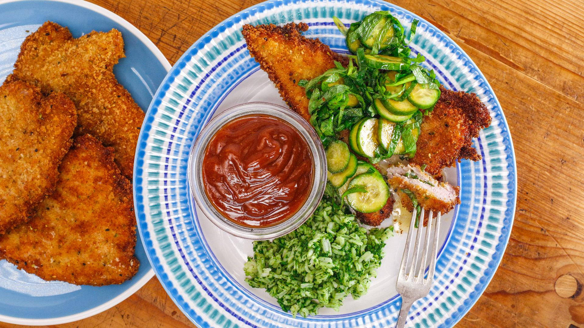 Captivating Crunchy Tonkatsu With Green Salad And Sauce Background