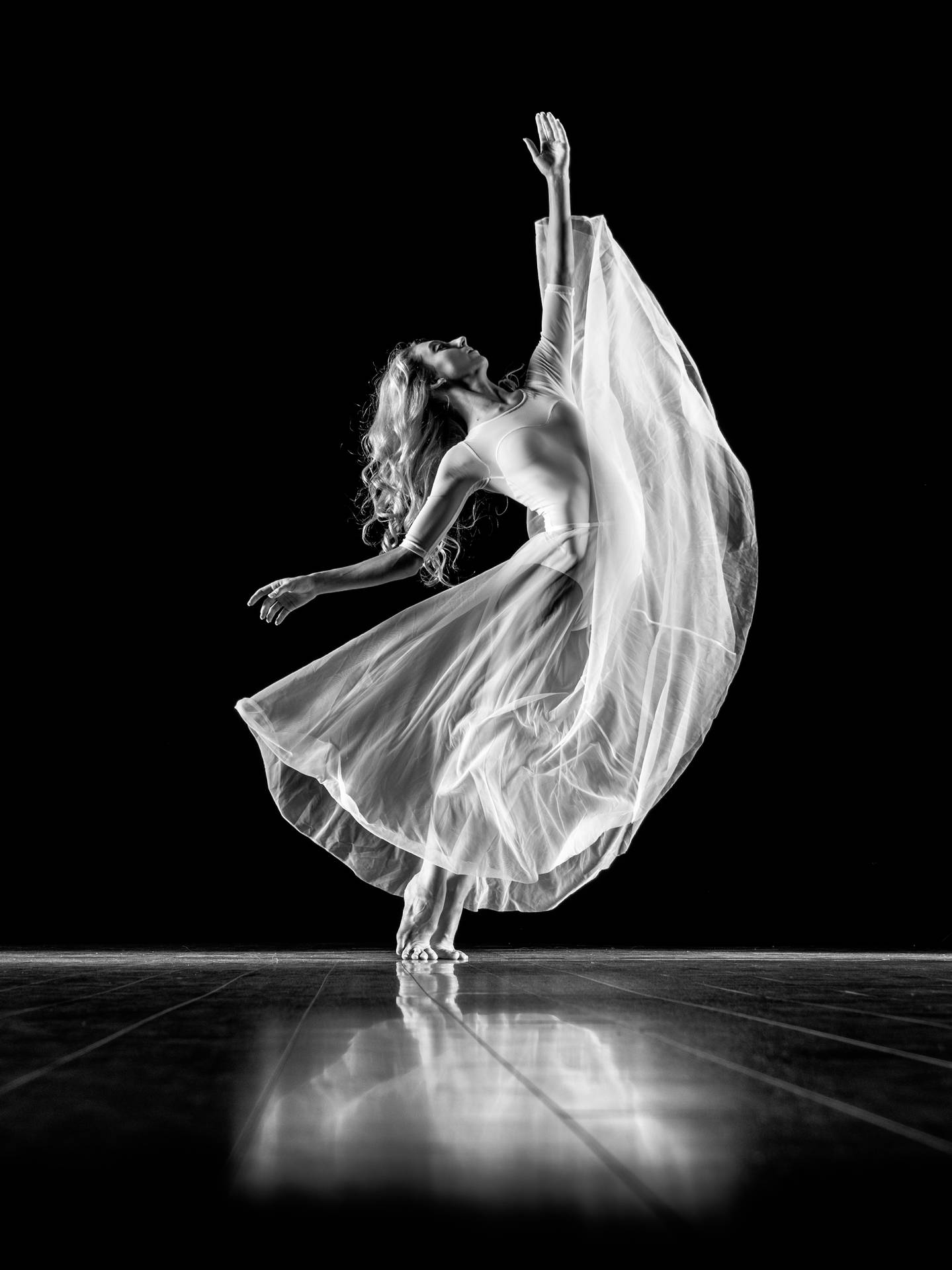 Captivating Dance Pose In Monochrome Background