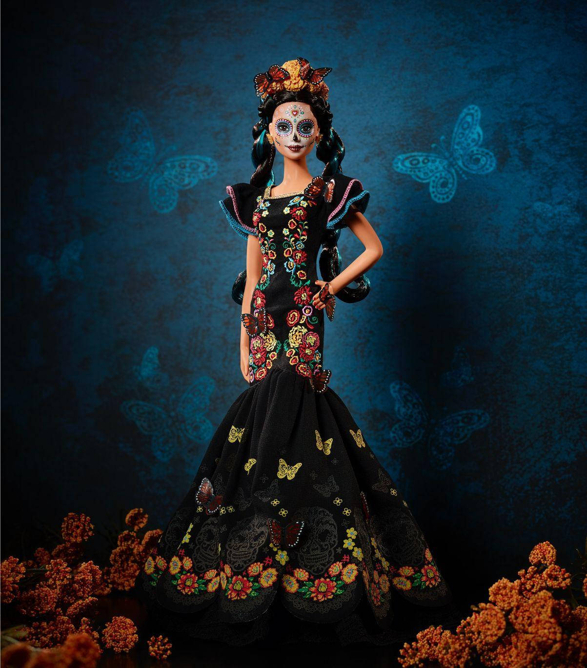 Captivating Dia De Los Muertos Doll Donned In Traditional Attire.