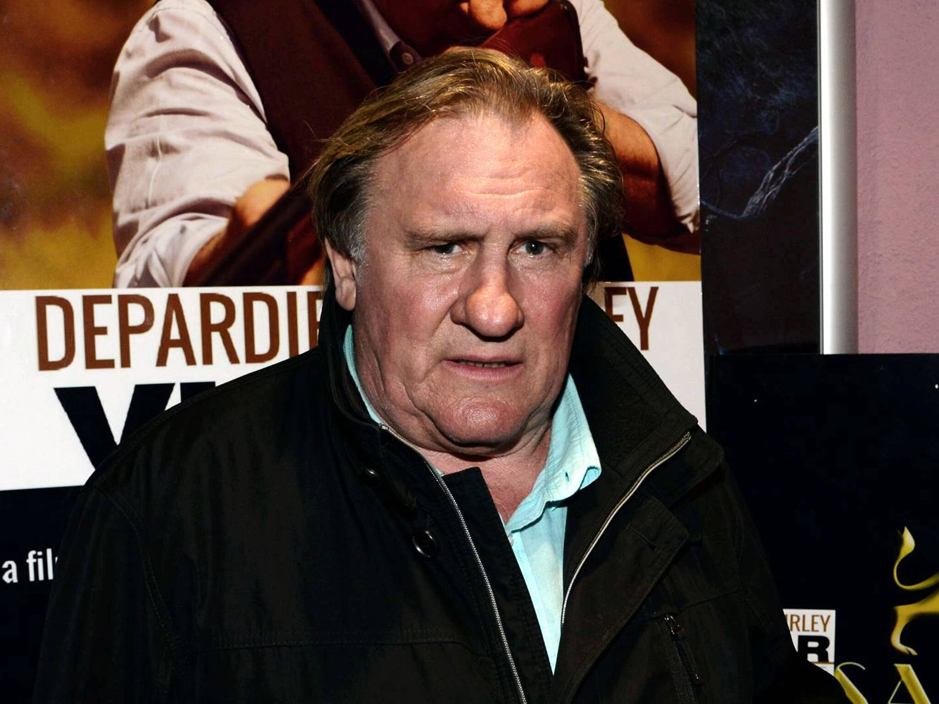 Captivating Gerard Depardieu In Iconic Movie Poster Background