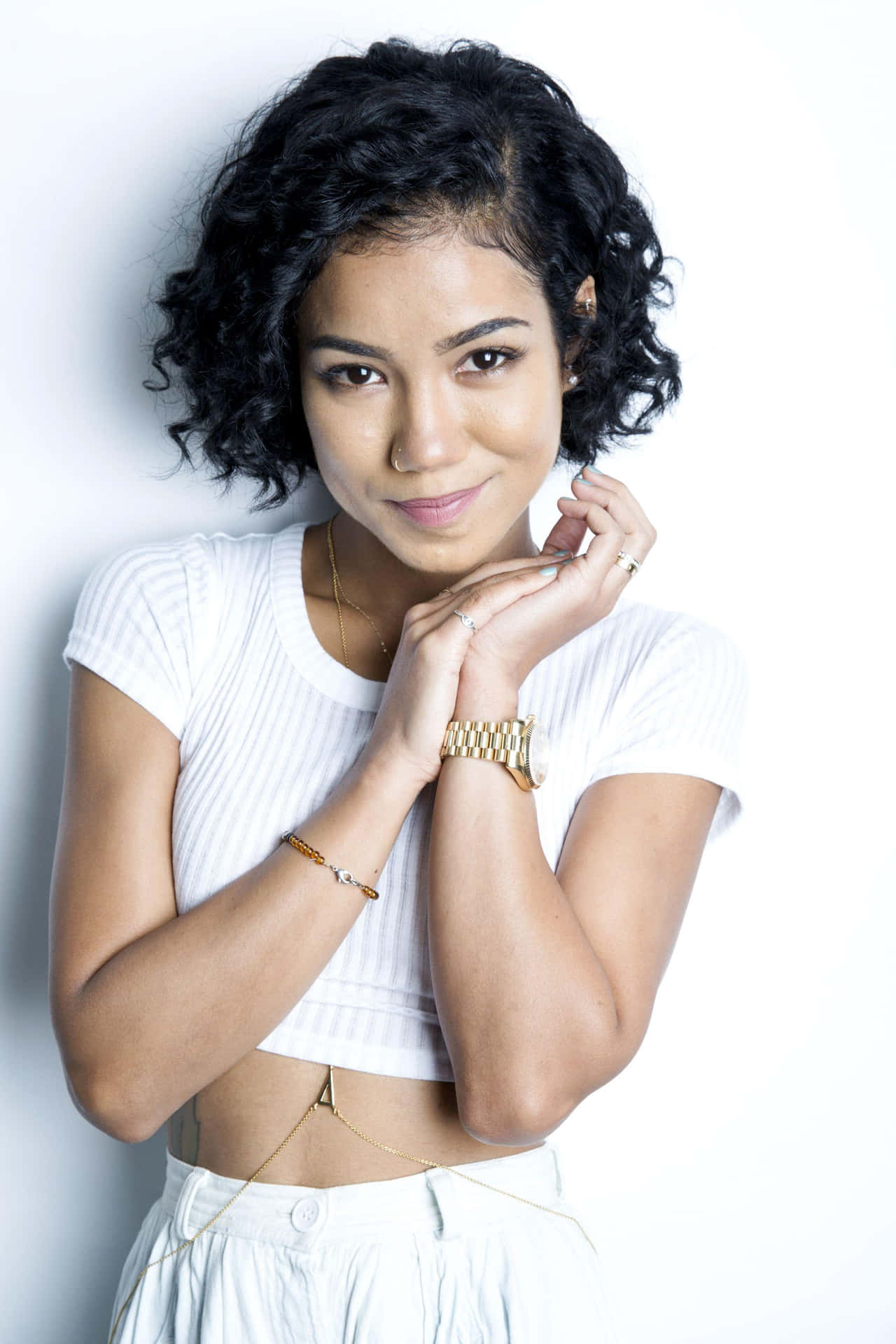 Captivating Jhene Aiko Posing For A Photoshoot Background