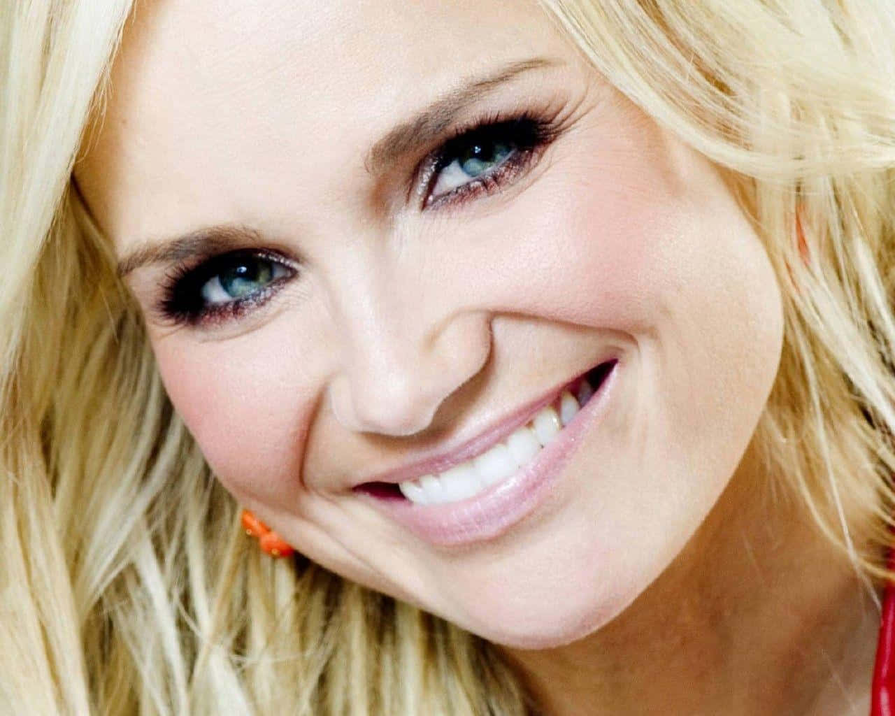 Captivating Kristin Chenoweth In A Sophisticated Pose Background