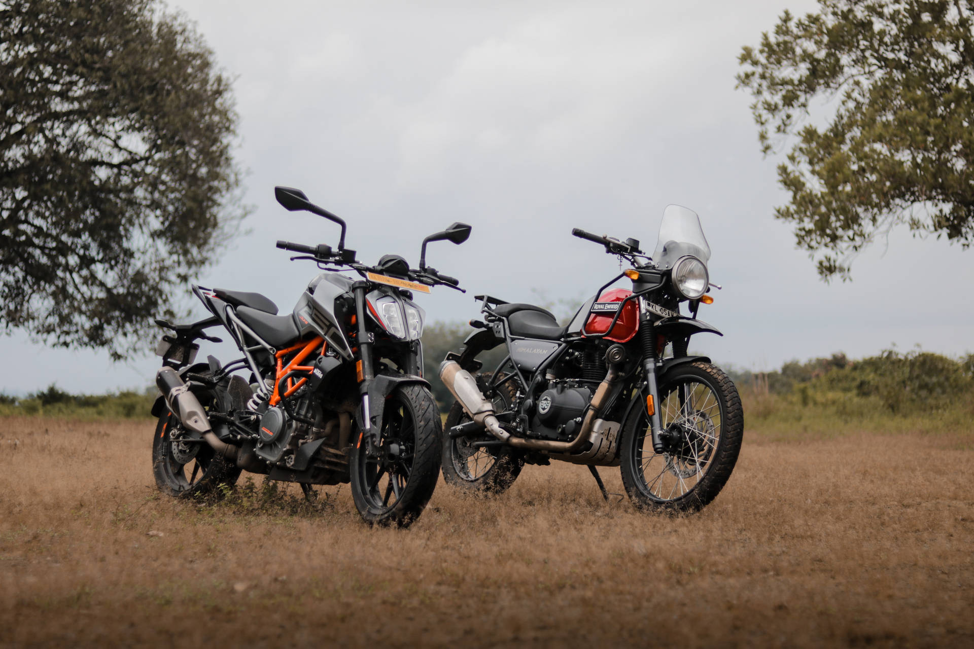 Captivating Ktm Duke 200 Twins Parked Side-by-side Background